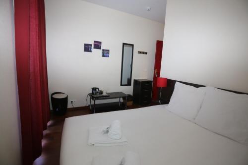 Apartamento O'sullivans Bar And Hotel