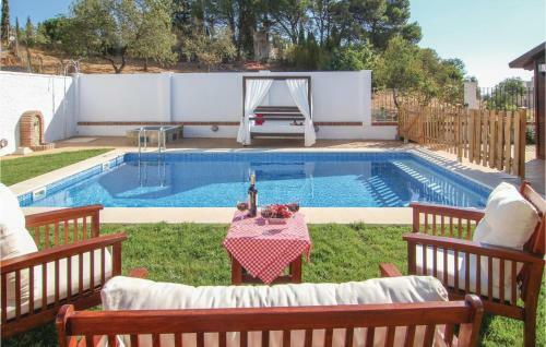 Four-bedroom Holiday Home In Yunquera