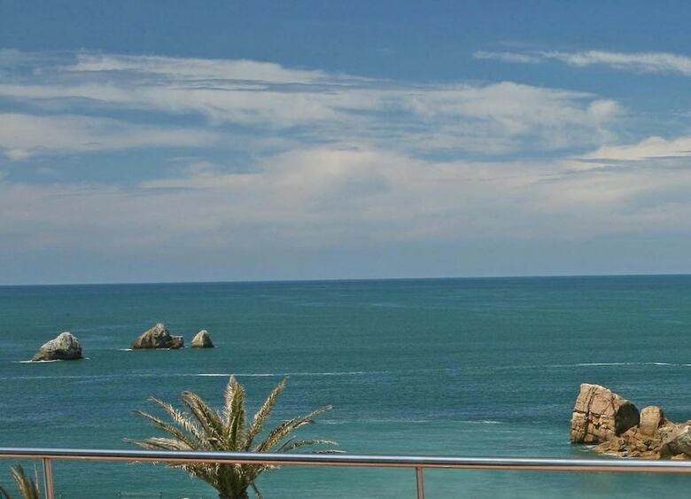 Apartamentos Playa De Portio