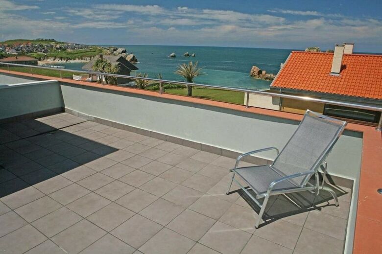 Apartamentos Playa De Portio