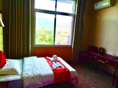 Xishuangbanna Jinjiangnan Business Hotel