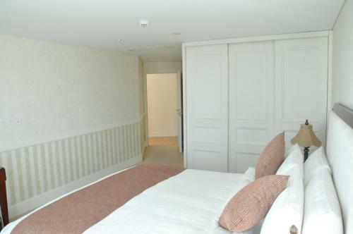 Qingdao Jinshan We+ Holiday Apartment ?wusi Square?