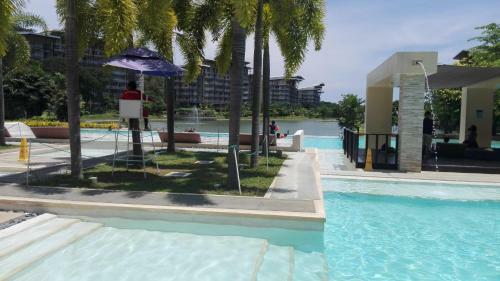 Apartamentos Lagoon View Condominium At Mount Pico de Loro And Hamilo Coast