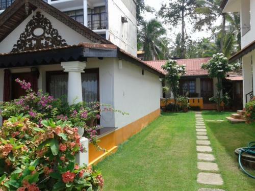 Hotel Kovalam Beach Cottage