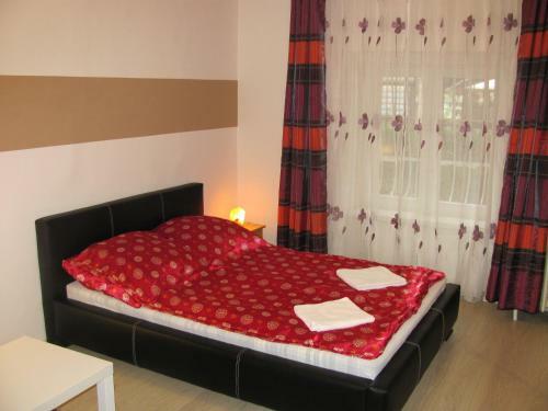 K�roly Apartments