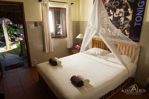 Hotel Joe's Cafe & Garden Resort