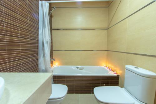 Apartamentos Completos Playa Suite A Carlos III