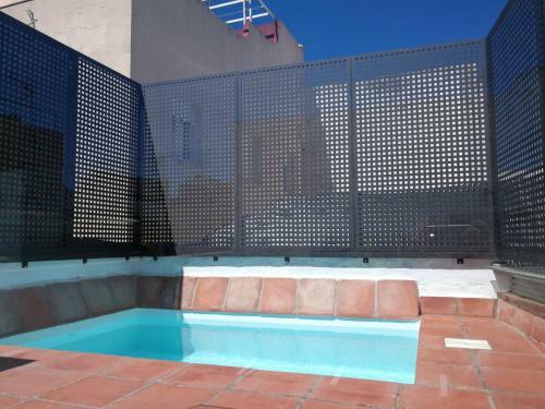 Reservaloen Casa Sevillana