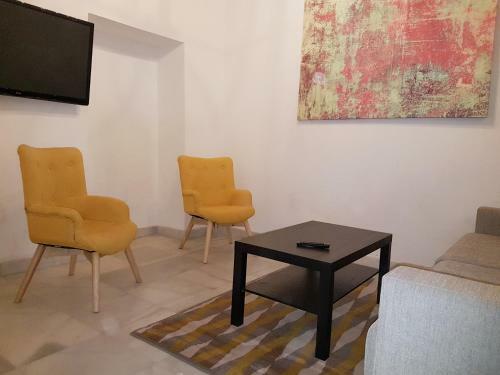 Reservaloen Casa Sevillana
