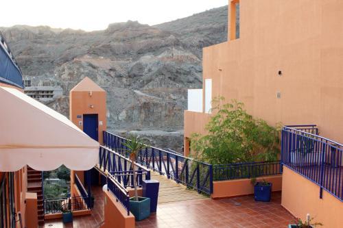 Luxury African Apartment With Pool In Taurito, Mog�n.