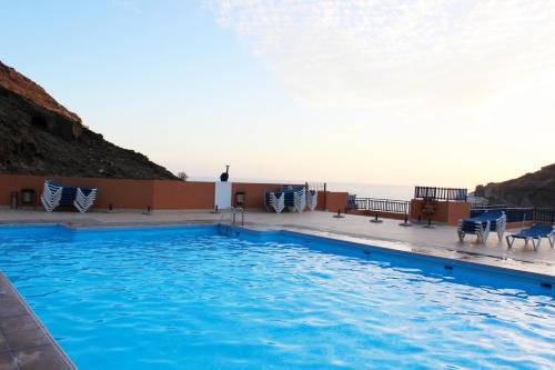Luxury African Apartment With Pool In Taurito, Mog�n.