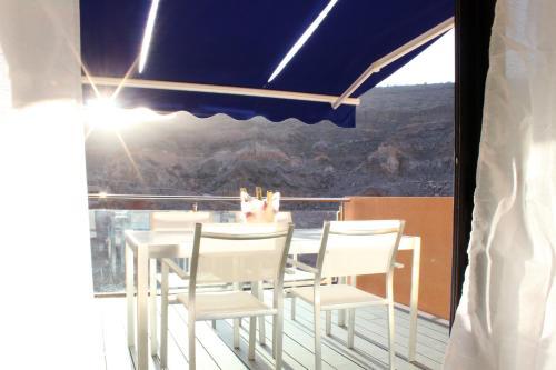 Luxury African Apartment With Pool In Taurito, Mog�n.