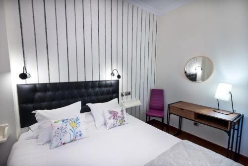 Hostal Cuatro Caminos Rooms