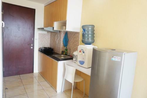Minimalist Studio Apartment At Tamansari Panoramic Apartment By Travelio