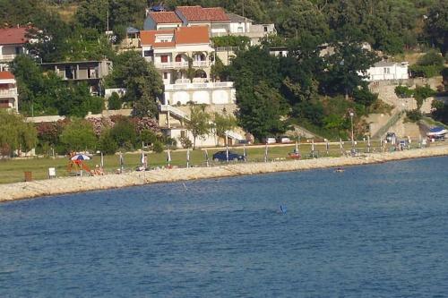 Apartments By The Sea Lopar (rab) - 12534
