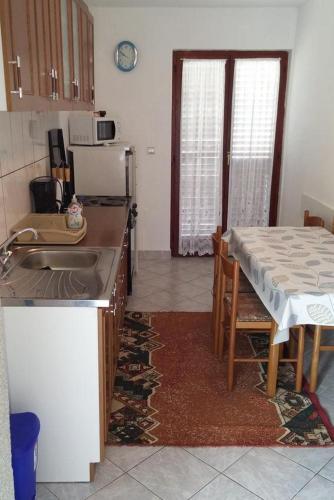 Apartments By The Sea Lopar (rab) - 12534