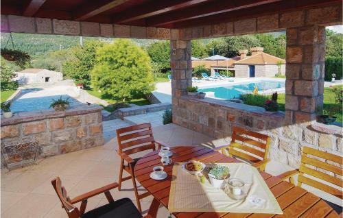 Four-bedroom Holiday Home In Vitaljina