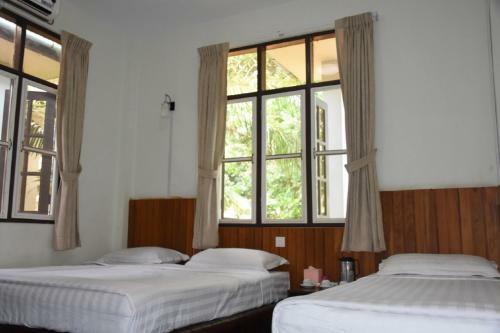 Happy Chaungtha Motel