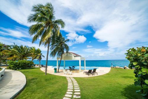 Apartamento Whispering Seas - 2 Bedroom Luxury Ocean Front Condo