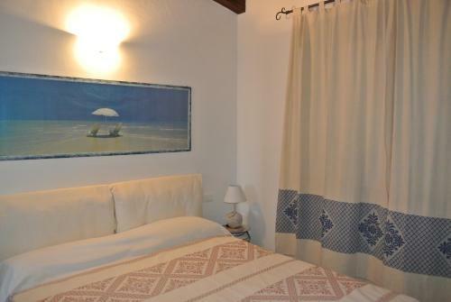 Apartamento Sardinia Blu Residence