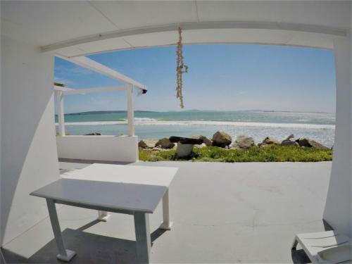 Hostal 114 On Main Beach House