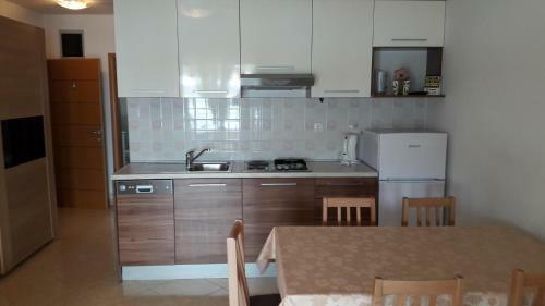 Apartments By The Sea Caska, Pag - 13002