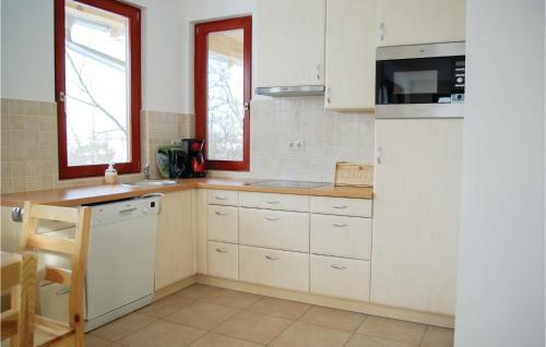Four-bedroom Holiday Home In Szolad