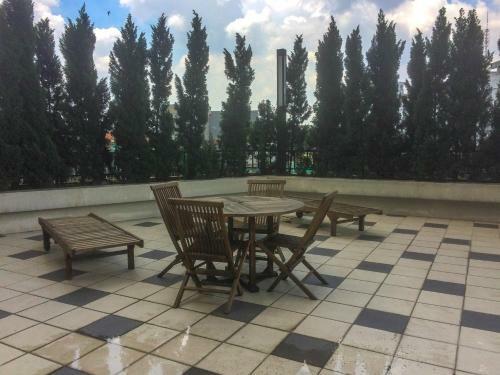 Homey Studio The Oasis Cikarang Apartment By Travelio