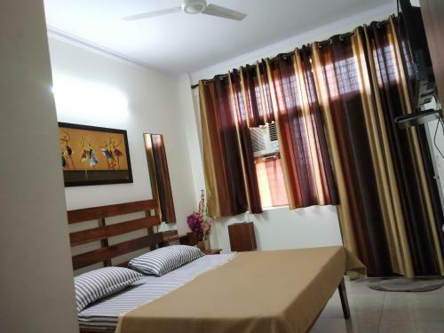 The Raveesh Service Apartment