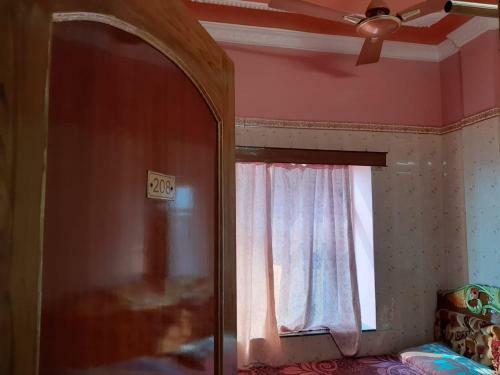 Hotel Goroomgo Sureswory Pampa Puri