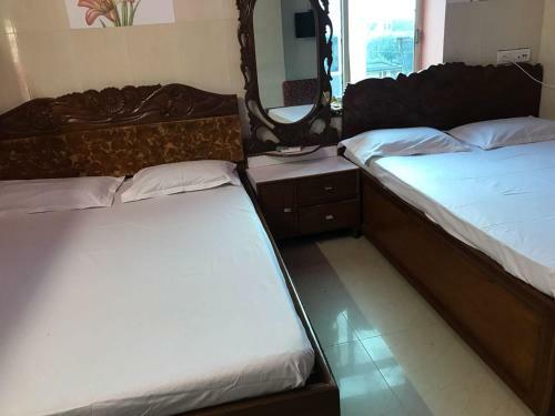 Hotel Goroomgo Sureswory Pampa Puri