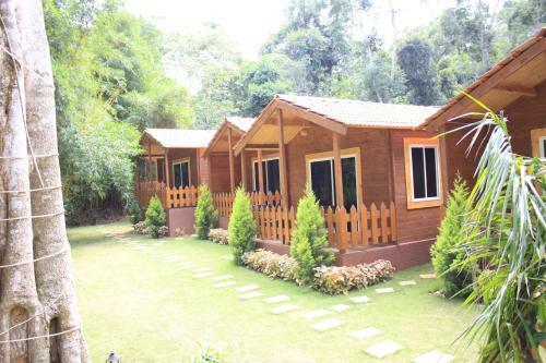Oyo 26892 Coorg Amodhini Wood Cottage Suits