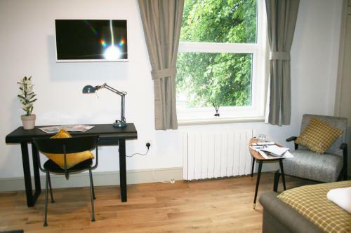 Apartamento Charming Executive Studios