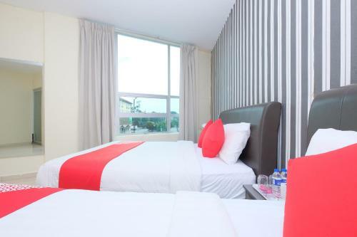 Hostal Oyo 89493 Q Hotel