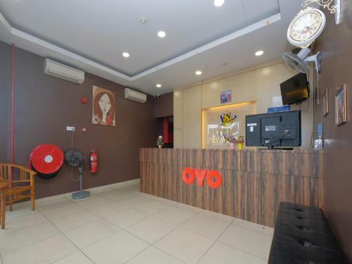 Hostal Oyo 89493 Q Hotel