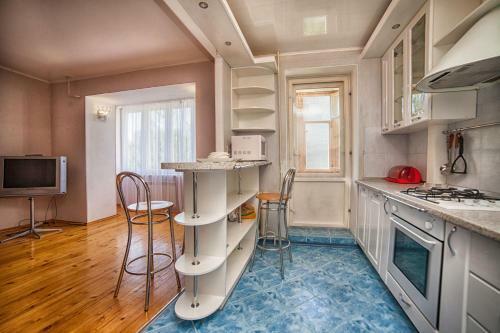 Apartamento 3-bedroom Studio On Nikolaeva 36a