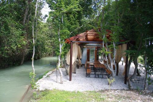 Camping "houses By The River"