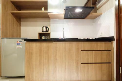 Dazzle Studio Room @ U-residence Apartment By Travelio