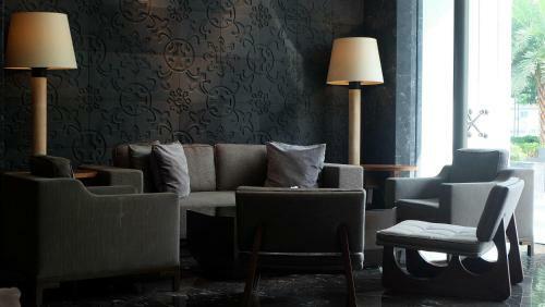 Dazzle Studio Room @ U-residence Apartment By Travelio