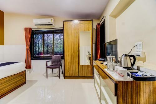Hotel Capital O 46872 Gunwant Holidays