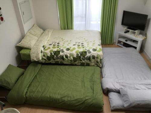 Apartamento Issyuku Hostel