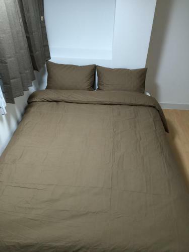 Apartamento Issyuku Hostel