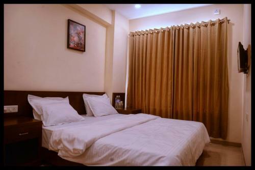 Hotel Malhar Grand