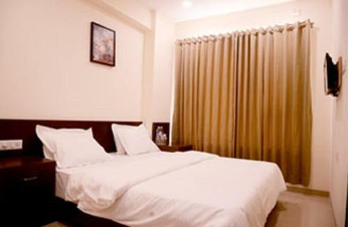 Hotel Malhar Grand