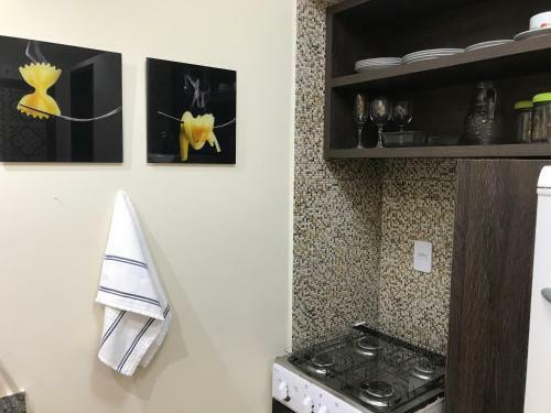Apartamento Costeira Praia - Belo Flat II (115)