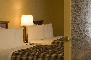 Merit Hotel & Suites