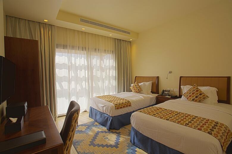 Apartamento Golden Tulip Sharma Resort