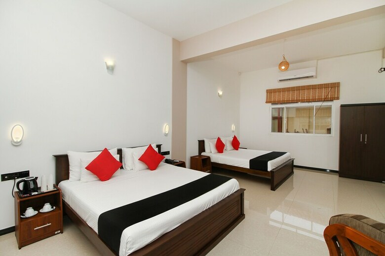 Hotel Capital O 311 Grace Beach Resort