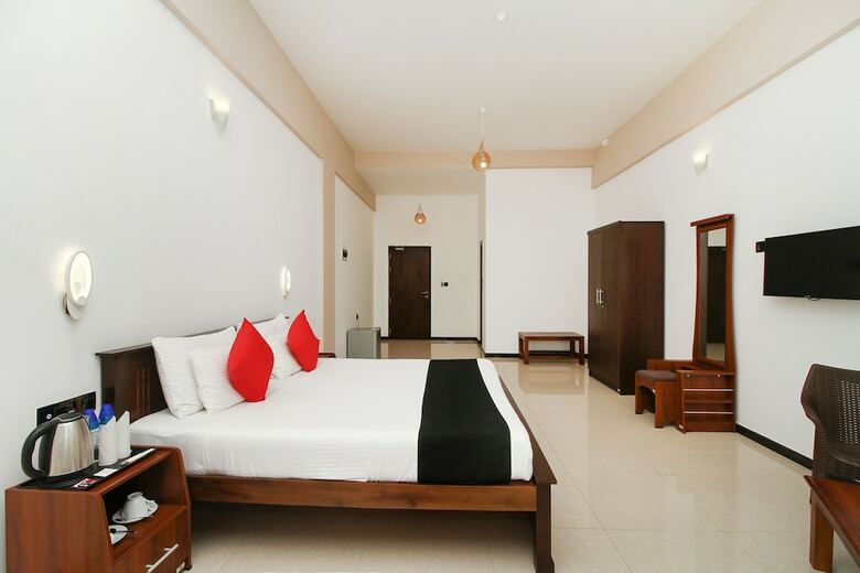 Hotel Capital O 311 Grace Beach Resort