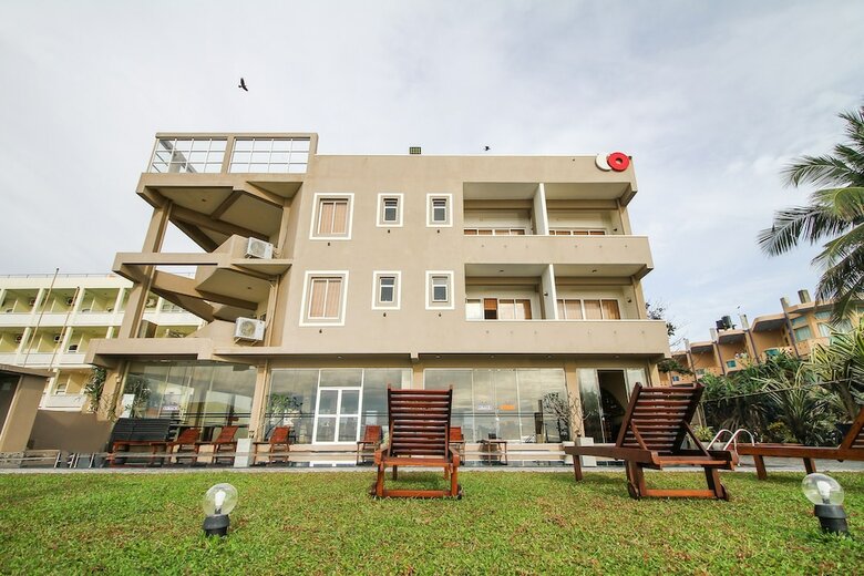 Hotel Capital O 311 Grace Beach Resort